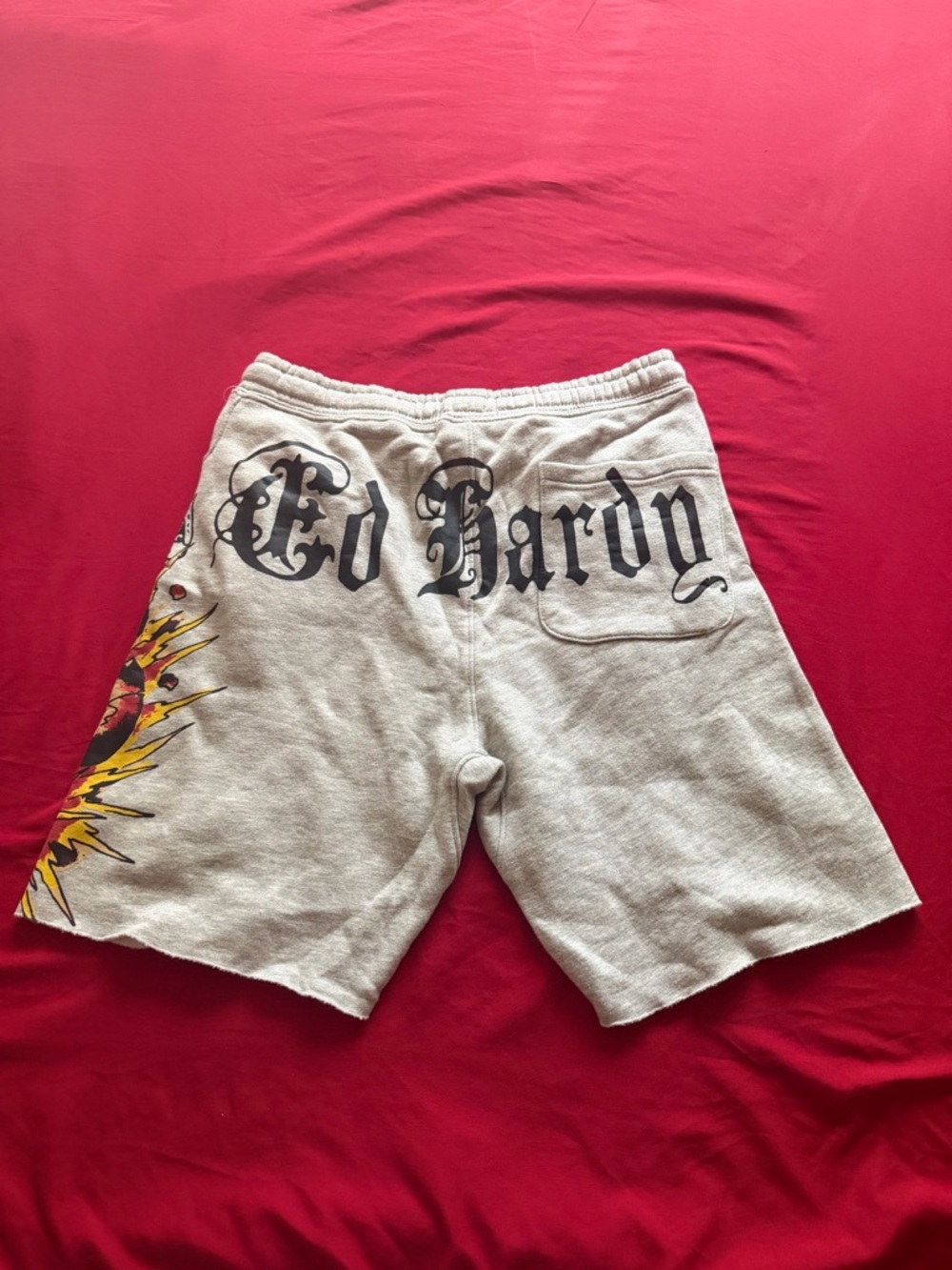 Ed Hardy Beige Graphic Athletic Shorts with Black Logo and Yellow Accent